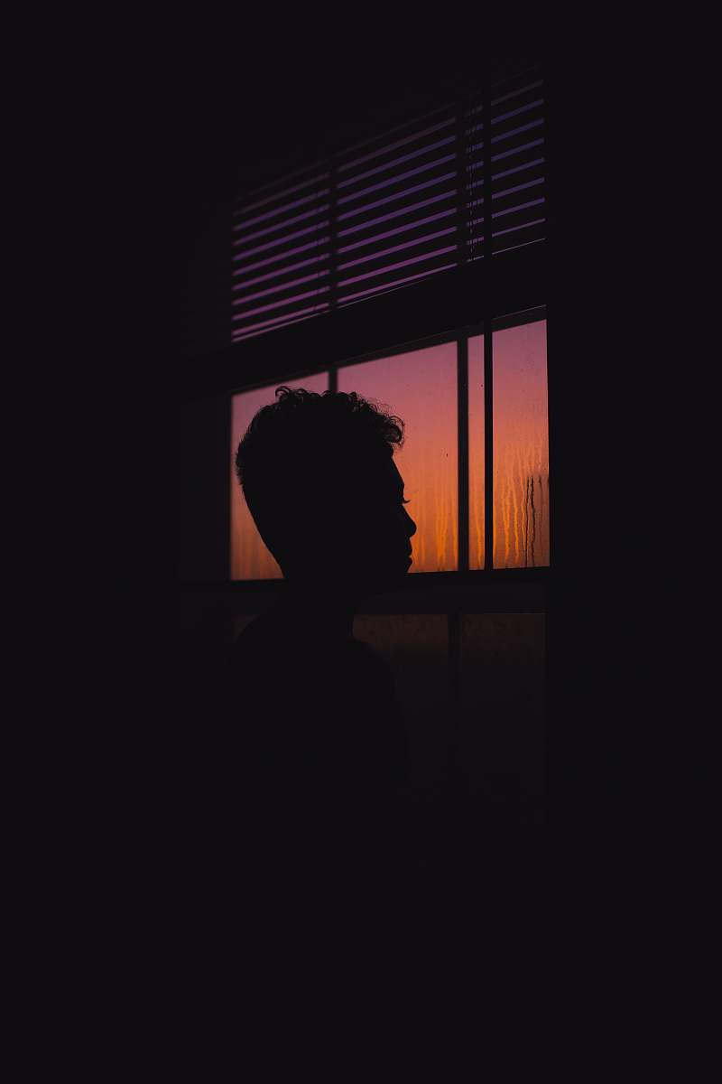 home decor person standing beside window window